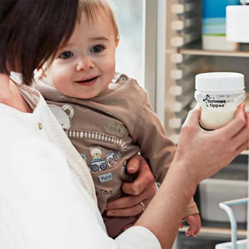 Lot de 4 couvercles de conservation de lait Tommee Tippee Lot de 4 couvercles de conservation de lait Tommee Tippee