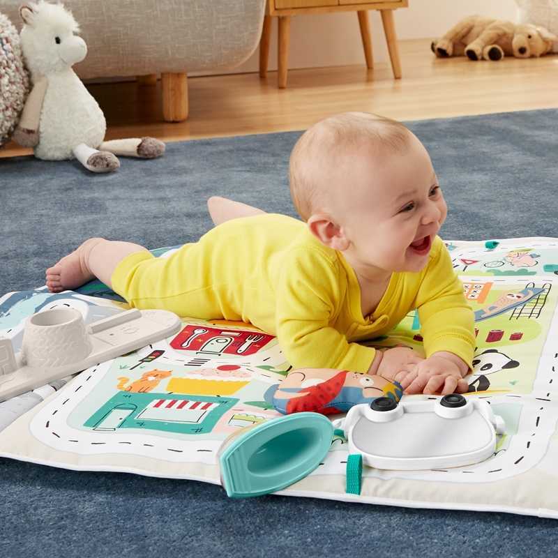 Fisher-Price Tapis de jeu évolutif musical pour …